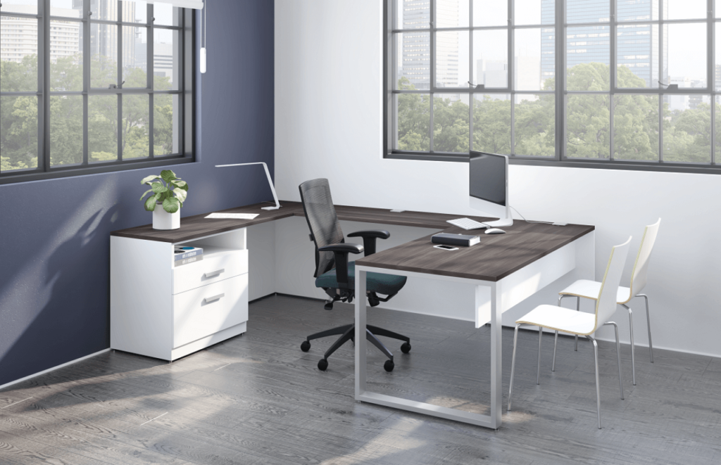 Small private office with desk and seating